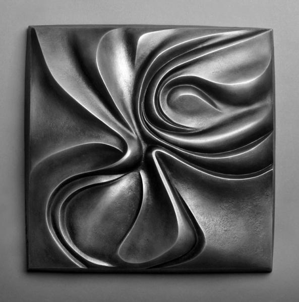 "Iris" 1995; 10x10x2" (cast aluminum)